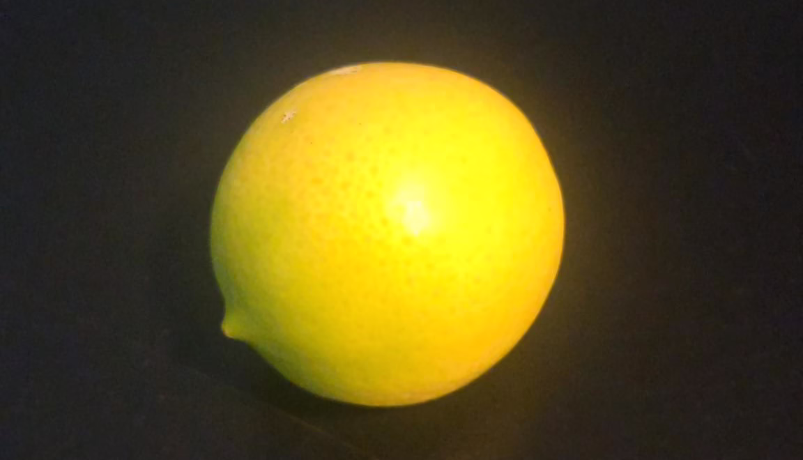 Lemon on black background
